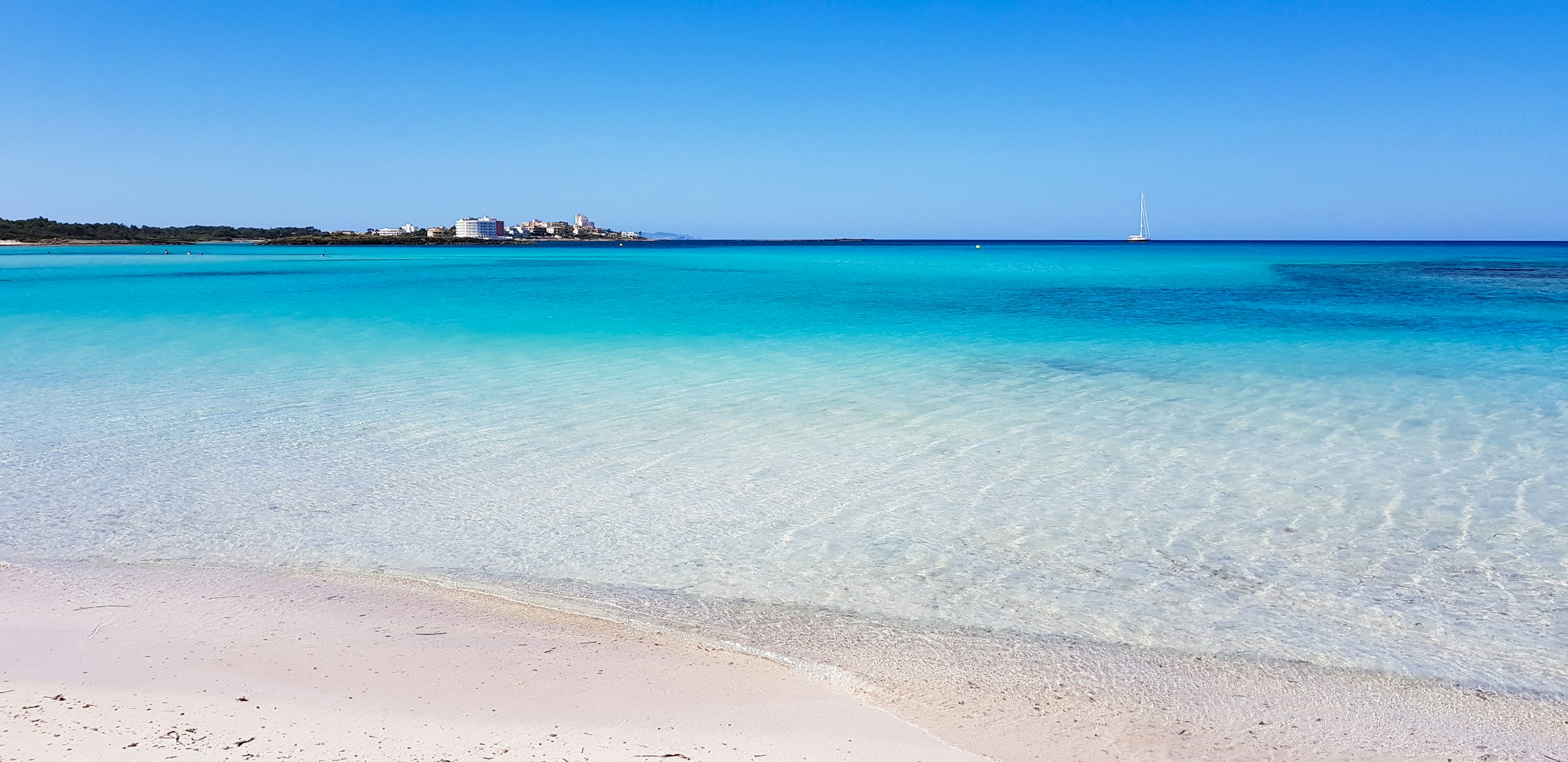 Aerial view of Es Trenc beach in Mallorca with pristine white sand and turquoise water